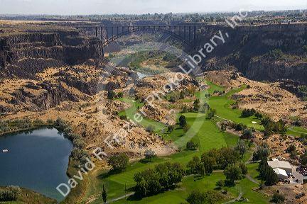 Blue Lakes Country Club golf course and the Perrine Bridge in the Snake River Canyon at Twin Falls, Idaho, USA.