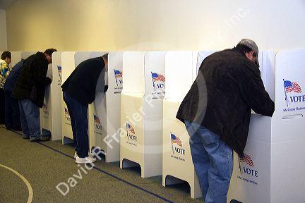 Voting in cardboard voting booths at a polling station in Boise, Idaho, USA.