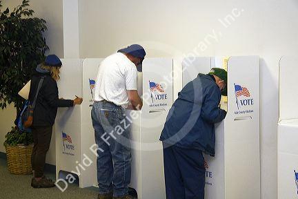 Voters use cardboard voting booths at a polling station in Boise, Idaho, USA.