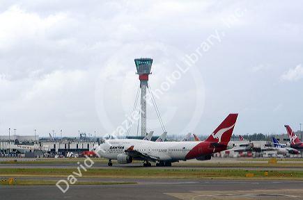 Airliners on the runway at London Heathrow Airport, England, United Kingdom.