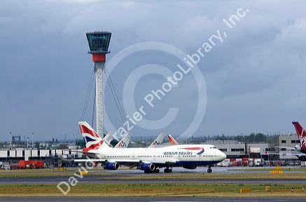 Airliners on the runway at London Heathrow Airport, England, United Kingdom.