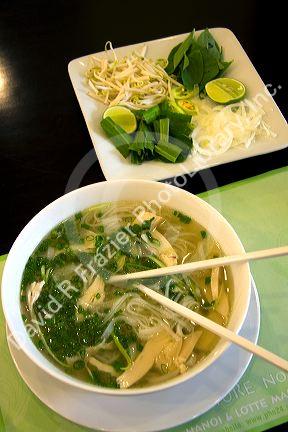 A bowl of Pho, Vietnamese rice noodle soup at a restaurant in Ho Chi Minh City, Vietnam.