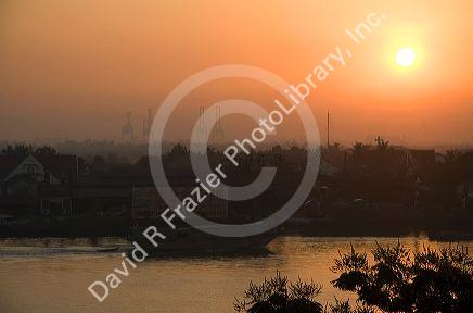 Sunrise over the Saigon River in Ho Chi Minh City, Vietnam.