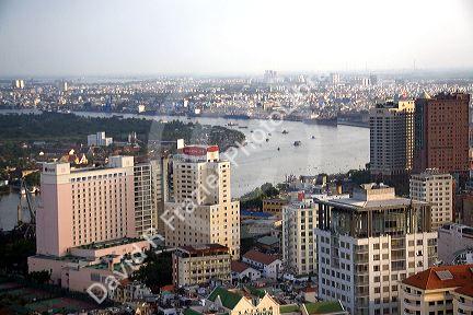 Cityscape view of Ho Chi Minh City and the Saigon River from atop the Saigon Trade Center skyscraper, Vietnam.