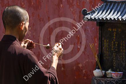 Prayer at the Jade Emperor Pagoda Buddhist temple in Ho Chi Minh City, Vietnam.