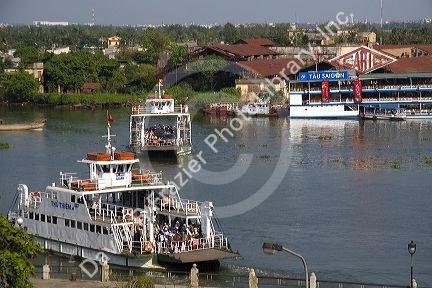 Ferry boats crossing the Saigon River in Ho Chi Minh City, Vietnam.