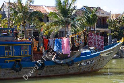 Laundry drying in a boat on the Thu Bon River at Hoi An, Vietnam.