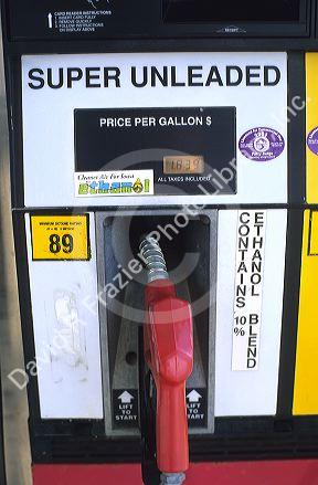 Unleaded gas pump with ethanol sign.