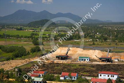 Piles of wood chips used at a paper mill in Phu Gia, Vietnam.