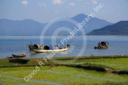Fishing boats in the bay along National Road 1A south of Phu Bai, Vietnam.