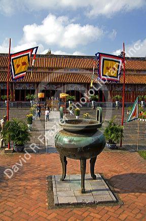 Large urn in front of the Imperial Temple within the Imperial Citadel of Hue, Vietnam.
