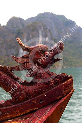 Dragon carving detail on a boat in Ha Long Bay, Vietnam.