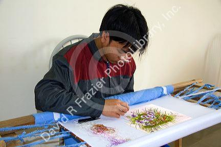 Disadvantaged Vietnamese youth learn embroidery at a vocational school named Kids First Vietnam in Dong Ha, Vietman.