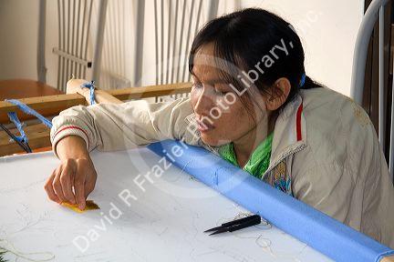 Disadvantaged Vietnamese youth learn embroidery at a vocational school named Kids First Vietnam in Dong Ha, Vietman.