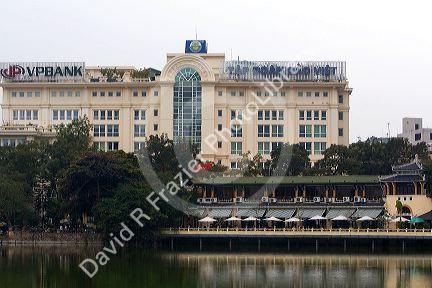 Buildings along Hoan Kiem Lake in Hanoi, Vietnam.
