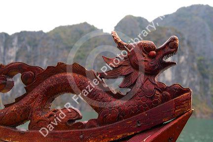 Dragon carving detail on a boat in Ha Long Bay, Vietnam.