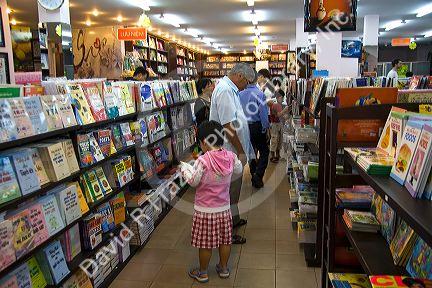 Vietnamese people shopping in a bookstore in Ho Chi Minh City, Vietnam.