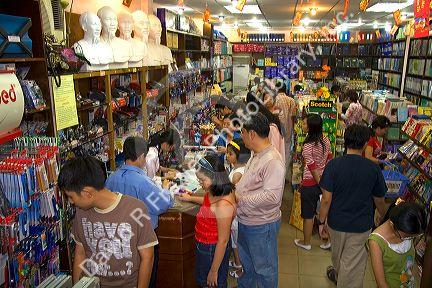 Vietnamese people shopping in a bookstore in Ho Chi Minh City, Vietnam.