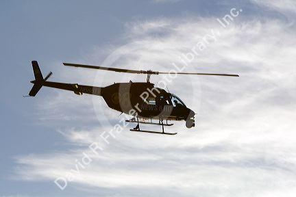 News helicopter flying over Mission Beach in San Diego, Southern California, USA.