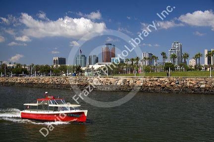 Boat in Rainbow Harbor at Long Beach, California, USA.