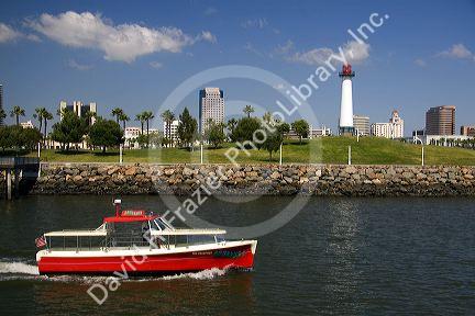 Boat in Rainbow Harbor at Long Beach, California, USA.