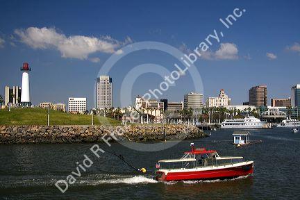 Boat in Rainbow Harbor at Long Beach, California, USA.