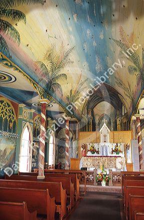 The interior of St. Benedicts painted church on Big Island Hawaii.