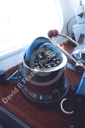 Ship compass on fishing boat.