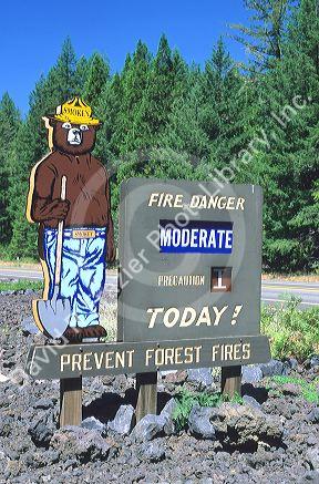 Smokey the bear forest service sign showing the fire danger in Oregon.