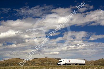Long haul truck traveling on Interstate 80 in Carbon County, Wyoming, USA.