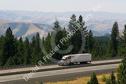 Truck transporting freight through the Blue Mountains near Pendleton, Oregon, USA.
