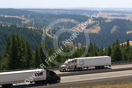 Trucks transport freight through the Blue Mountains near Pendleton, Oregon, USA.