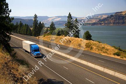 Truck transporting freight through the Columbia River Gorge near Hood River, Oregon, USA.