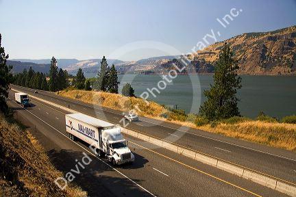 Truck transporting freight through the Columbia River Gorge near Hood River, Oregon, USA.