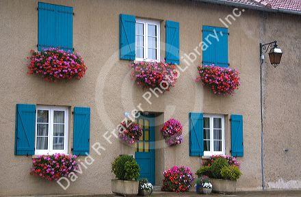 Flower boxes on homes in the commune of Rodemack, northeast France.
