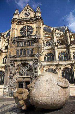 L'Ecoute modern sculptural public art by Henri de Miller in front of the Eglise Saint-Eustache in Paris, France.