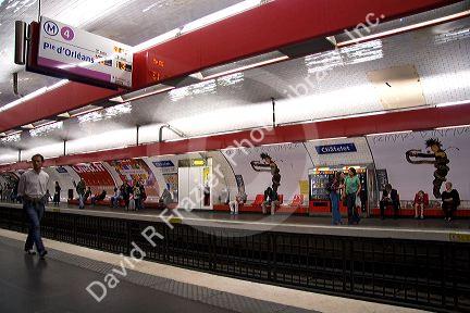 People wait underground on the platform of Chatelet Paris Metro station in Paris, France.