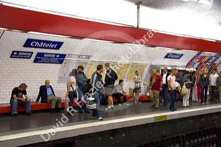 People wait underground on the platform of Chatelet Paris Metro station in Paris, France.