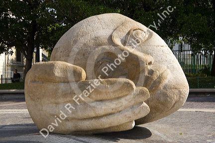 L'Ecoute modern sculptural public art by Henri de Miller in front of the Eglise Saint-Eustache in Paris, France.