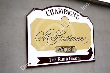 Sign for M. Hostomme Champagne winery in Chouilly, northeast France.