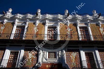 Talavera tile and red brick facade of the Museo Universitario in the city of Puebla, Puebla, Mexico.