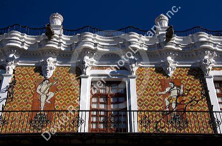 Talavera tile and red brick facade of the Museo Universitario in the city of Puebla, Puebla, Mexico.