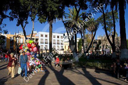 Strolling along the plaza in the city of Puebla, Puebla, Mexico.