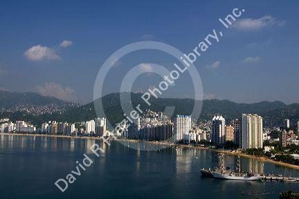 Acapulco Bay lined with hotels in Acapulco, Guerrero, Mexico.