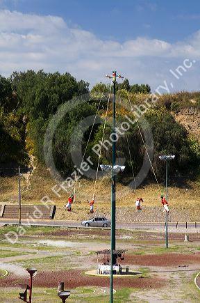 Men perform the Dance of Papantla's flyers in Cholula, Puebla, Mexico.