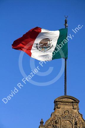 The Flag of Mexico atop the National Palace in Mexico City, Mexico.
