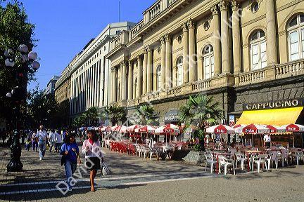 Street scene with sidewalk cafe in Santiago, Chile.