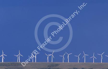 Windmills lined up along a ridge near Arlington, Wyoming.