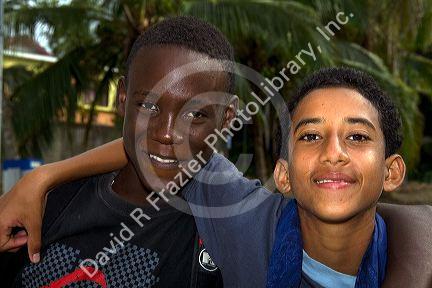 Costa Rican afro-caribbean teen with spanish native teen at Limon, Costa Rica.
