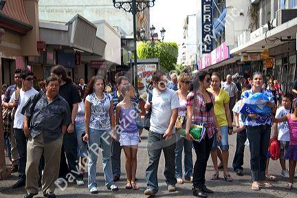 Pedestrians on a walking street in San Jose, Costa Rica.